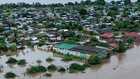 Dozens of people killed in torrential rains and floods across southern Africa