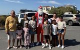 Santa Eben brings Christmas cheer to kids