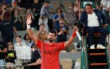 Djokovic eases into last-16 with 99th French Open win