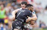 Sharks hold off Scarlets for first win