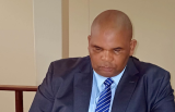 Senior health official Kupelo pleads not guilty