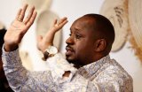 Kenyan police arrest rights activist Mwangi over role in deadly protests