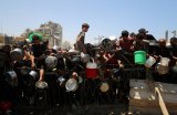 Six more die of hunger in Gaza, Israel says UN trucks make fuel delivery