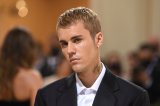 Justin Bieber Reclaims Infamous Viral Paparazzi Confrontation On New Album Swag