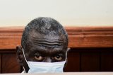 IN PICS | Ugandan opposition politician Kizza Besigye charged with treason