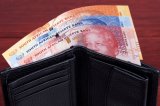 Why is South African economy failing behinds its counterparts?