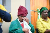 Centenarian and daughter of beneficiary who has since died receive keys to new homes