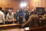 Senzo Meyiwa trial focuses on alleged intruder's gold tooth