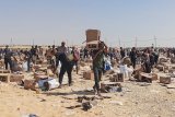 US group distributing aid in Gaza reopens sites after deadly shootings