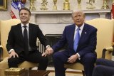 Macron Boldly Interrupts Trump To Correct His False Claim On Ukraine Aid