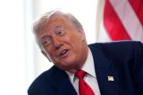 A Checked-Out Trump Posts Childish Memes As The US Government Shutdown Continues