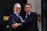 What Is In The UK's New 'Groundbreaking' One-In, One-Out Migrant Deal With France?