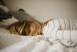 4 Rules For Healthy Lie-Ins, According To Sleep Experts