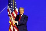 Trump Proud To Take 'Freedom Of Speech Away' With Order Banning Flag Burning
