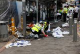 Palestinian gunmen kill six at Jerusalem bus stop