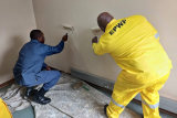 Mkhwanazi picks up paint roller to revamp police pound for Mandela Day