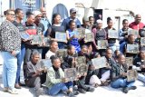 Volunteers honoured for helping transform old post office into arts centre