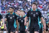 Battered and bruised All Blacks limp into Auckland