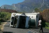 Truck transporting mangoes jack-knives on Robinson Pass – PHOTO