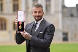 David Beckham receives knighthood from King Charles III