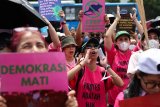 Indonesia fires officer involved in killing bystander as protests continue