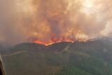 Franschhoek fire jumps Berg River, rages out of control