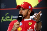 I wish him all the best, Hamilton says of old foe Horner
