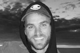 Hundreds pay tribute in paddle out for kite surfer Graham Howes