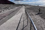Cape Town braces for wind season by ‘digging out’ beaches