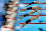 Pieter Coetzé wins 50m backstroke heat on quest for third medal