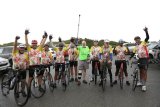 Grandads Army cycle into East London to cheers and tears