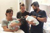 Twins’ triumphant homecoming after life-threatening defect