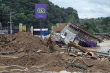 Death toll rises to 14 in South Korea as heavy rain triggers landslide and flooding