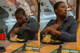SA woman goes viral for sneaking food into her top at restaurant – WATCH