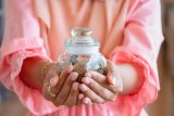 Are women better at managing money?