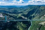 World’s highest bridge opens to traffic – WATCH