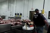 US immigration raid of Omaha meat plant cuts staff, fuels food production worries