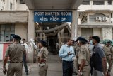Rescuers search for missing people, aircraft parts after Air India crash kills more than 240