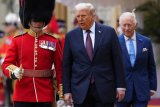 Donald Trump begins historic state visit to UK amid pomp and protests