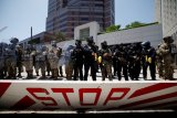 US Marines make first detention in LA as more protests expected