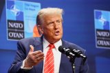 Trump signals US may ease Iran oil sanction enforcement to help rebuild country