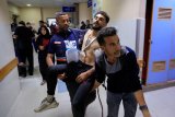 Israeli strike on aid delivery point kills 26 in Rafah, Hamas-linked media say