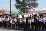 School girls march for better policing