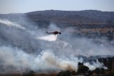 Greece shuts Acropolis for part of day, bans outdoor work as heat soars