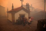 Wildfires kill three across southern Europe, force thousands to evacuate
