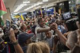 Palestine flotilla activists arrive home to hero’s welcome