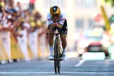 Evenepoel wins Tour time trial, Pogacar takes yellow jersey