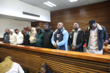 One of 10 officers accused of theft breaks down after court appearance