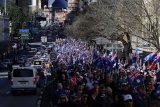 Thousands in Australia march against immigration, government condemns rally