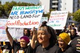 Give us each a hectare of land, say women farm workers